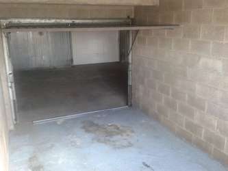 Box dans ilot de garages sécurisé