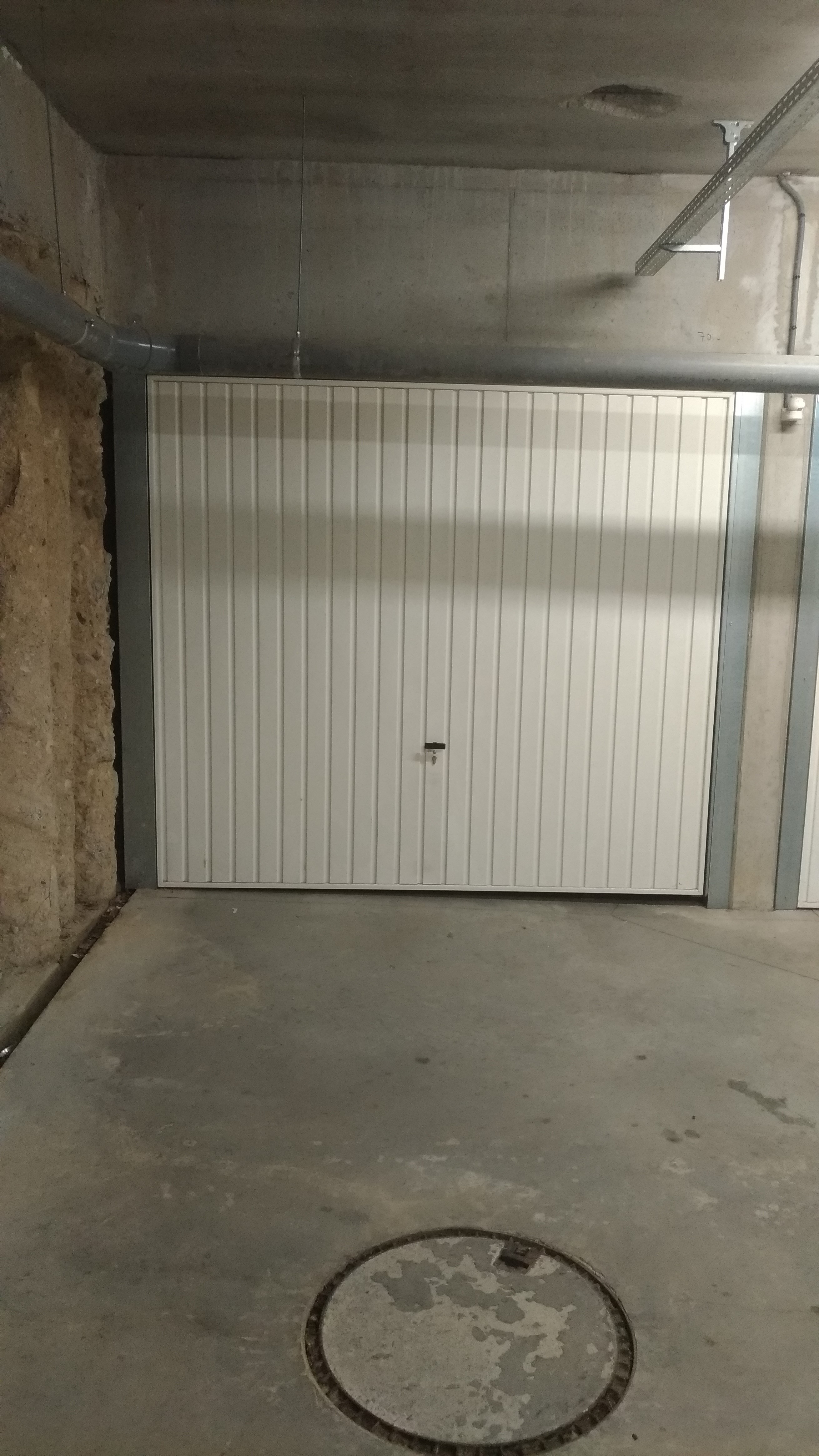 Garage fermé et sécurisé en sous-sol