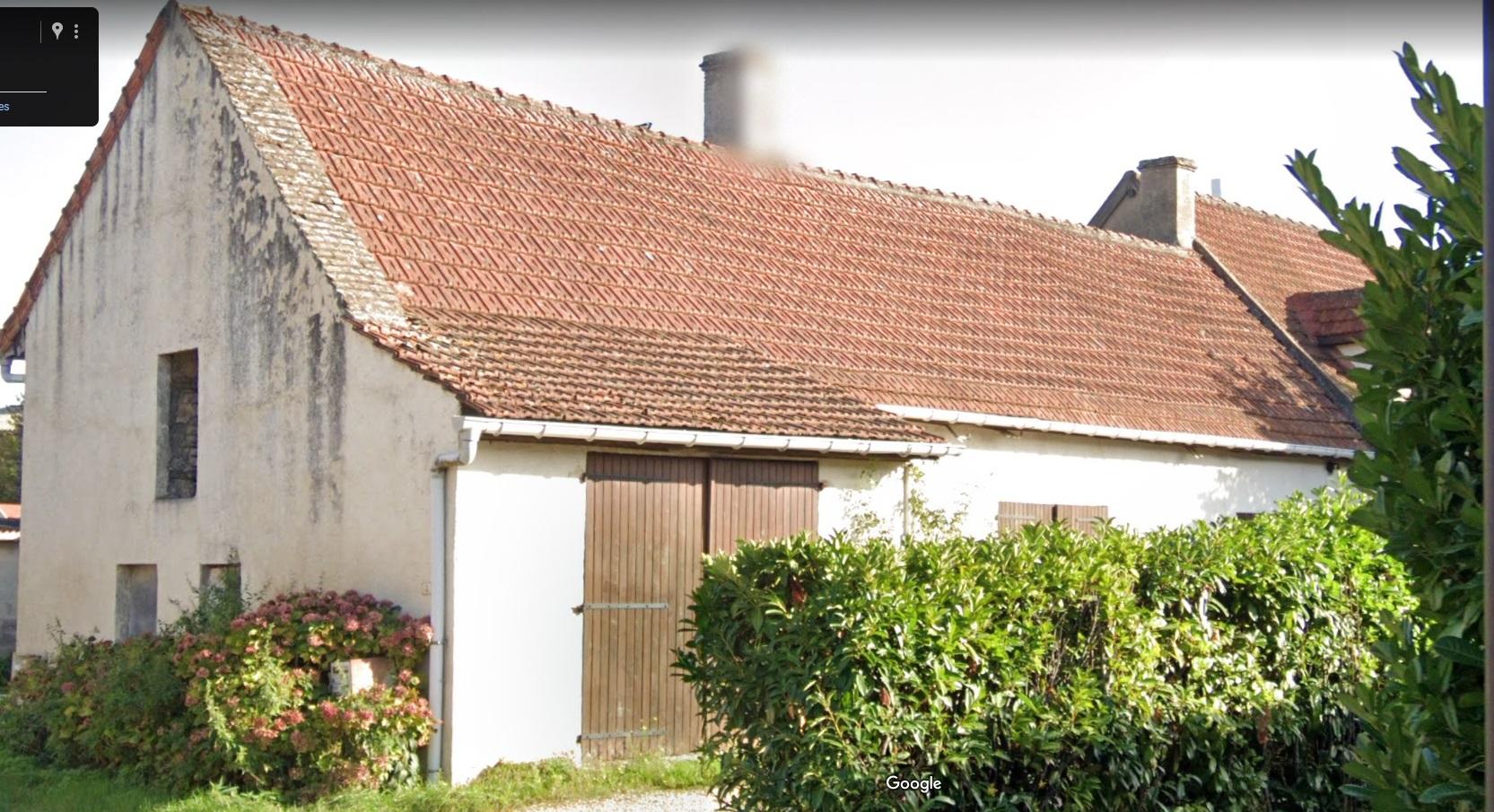 Garage avec sol recouvert de beton