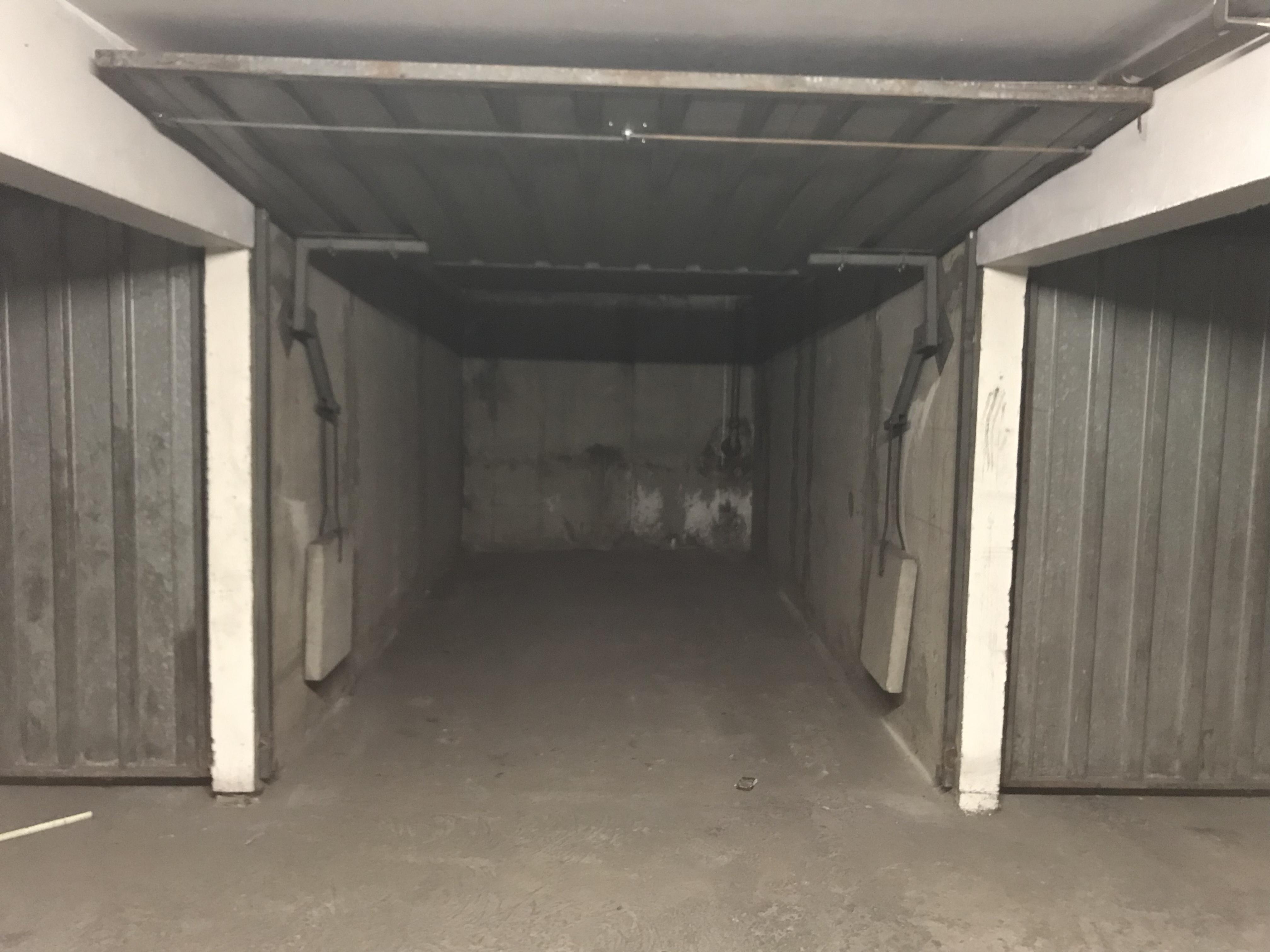 garage fermé en sous-sol / Parking / 13m²