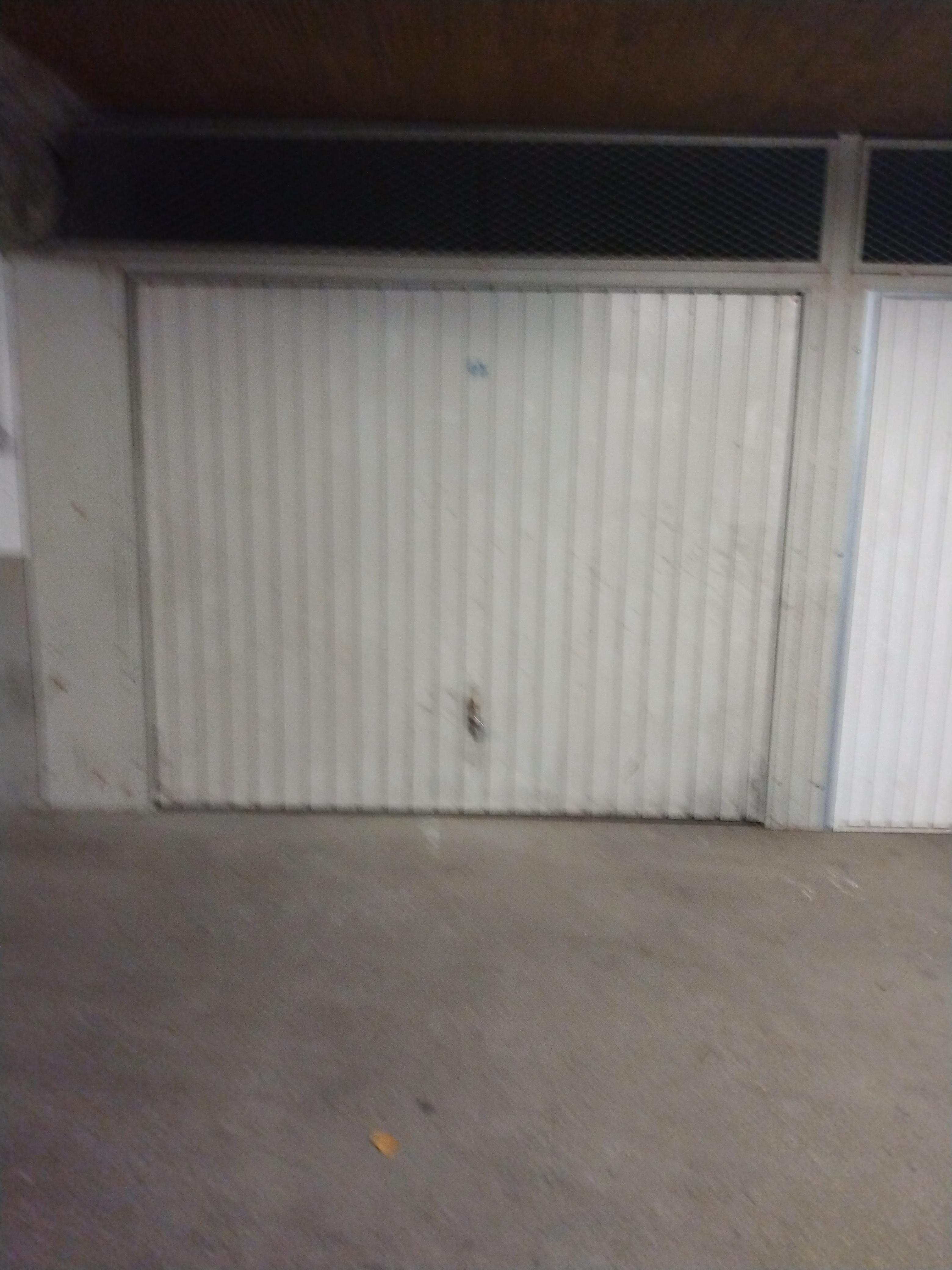 Garage fermé / Parking / 14m²