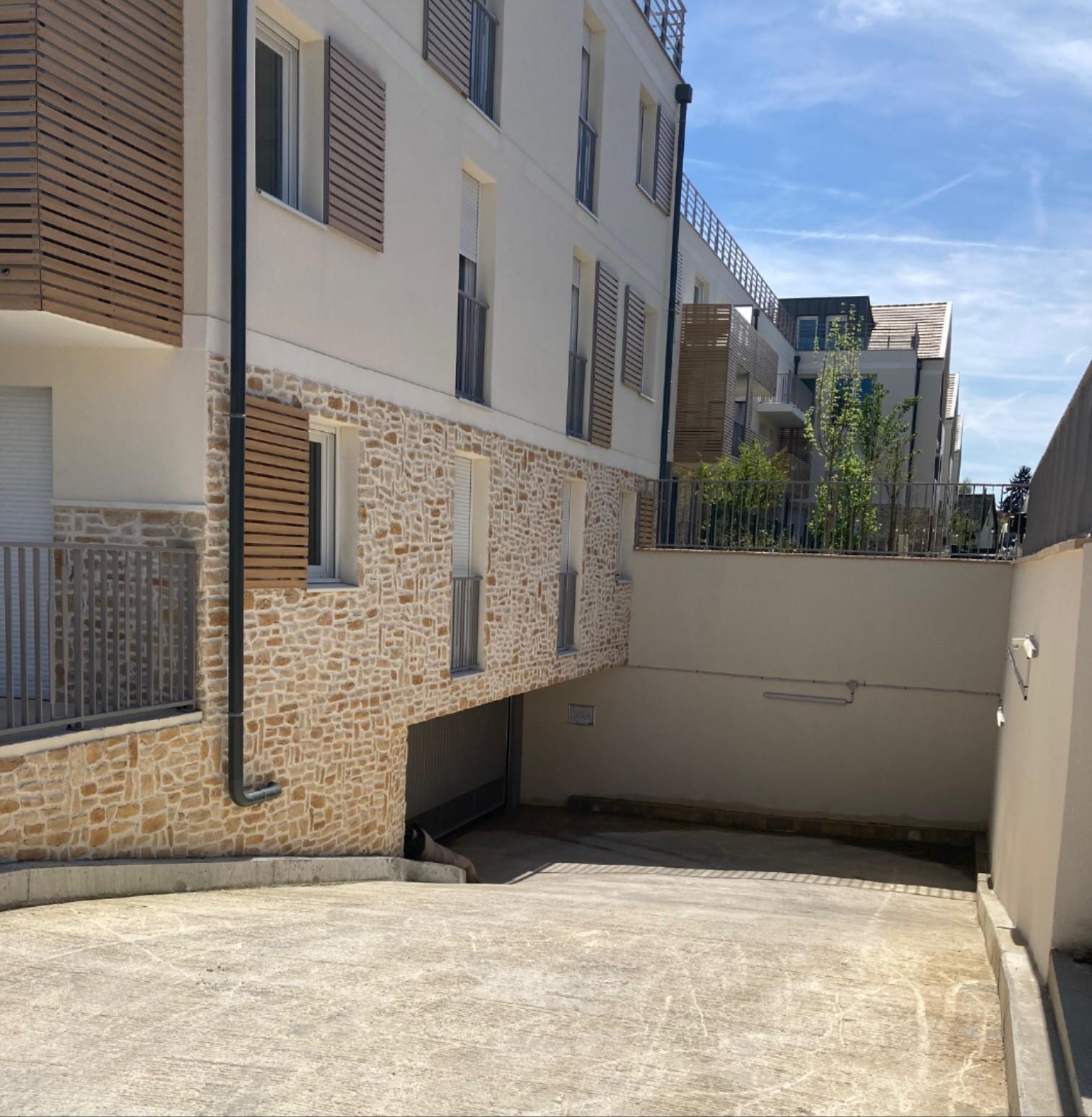 Place de Parking 1er sous-sol immeuble neuf Centre-bourg