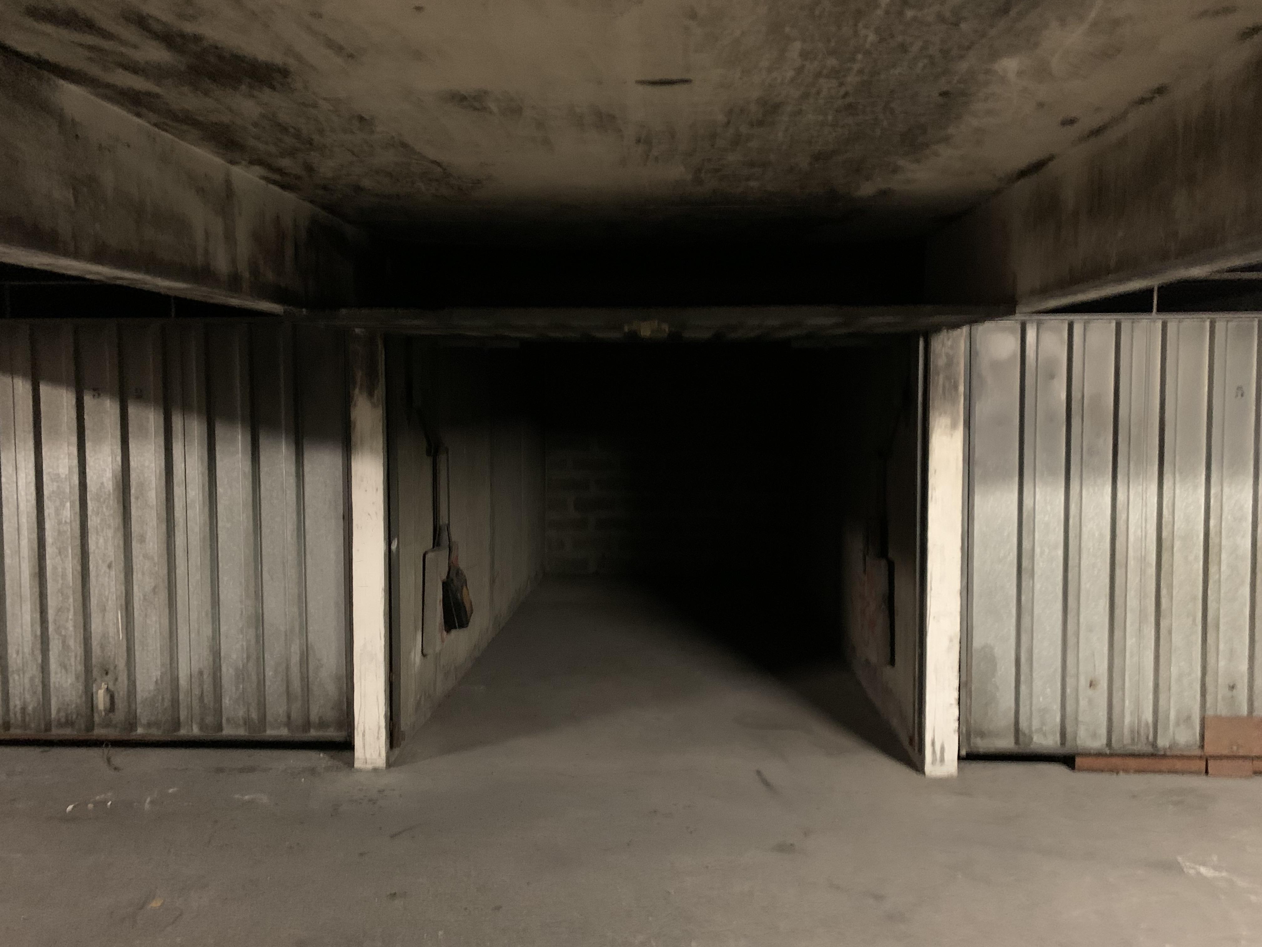 Garage fermé de 14m² en sous sol à